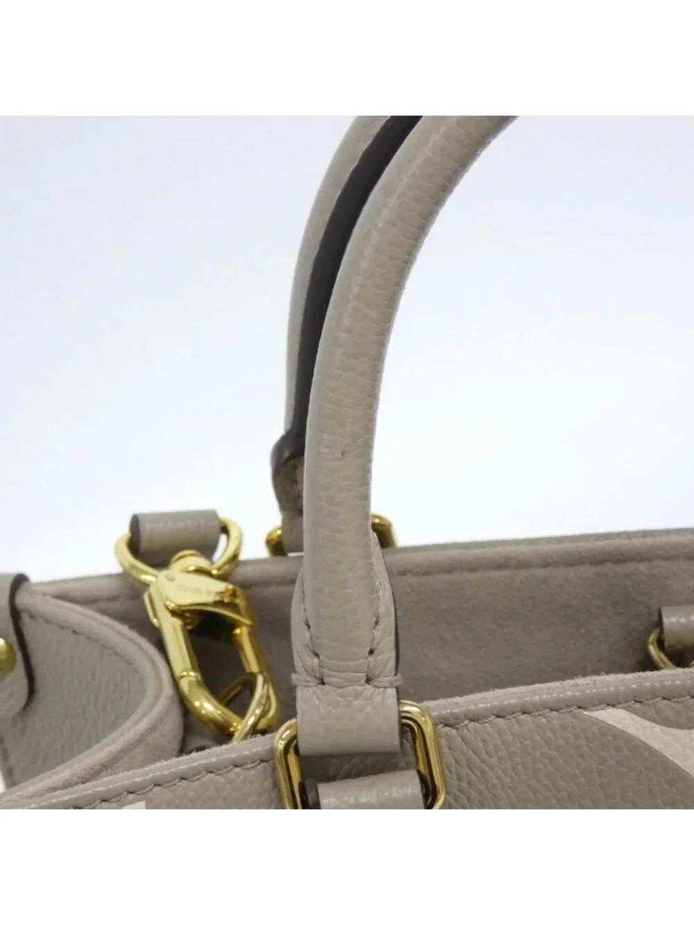 Louis Vuitton Bicolor Monogram Empreinte On The Go PM Bag